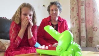 Crocodile Dentist game slomo - Evie and Freda playing at Christmas