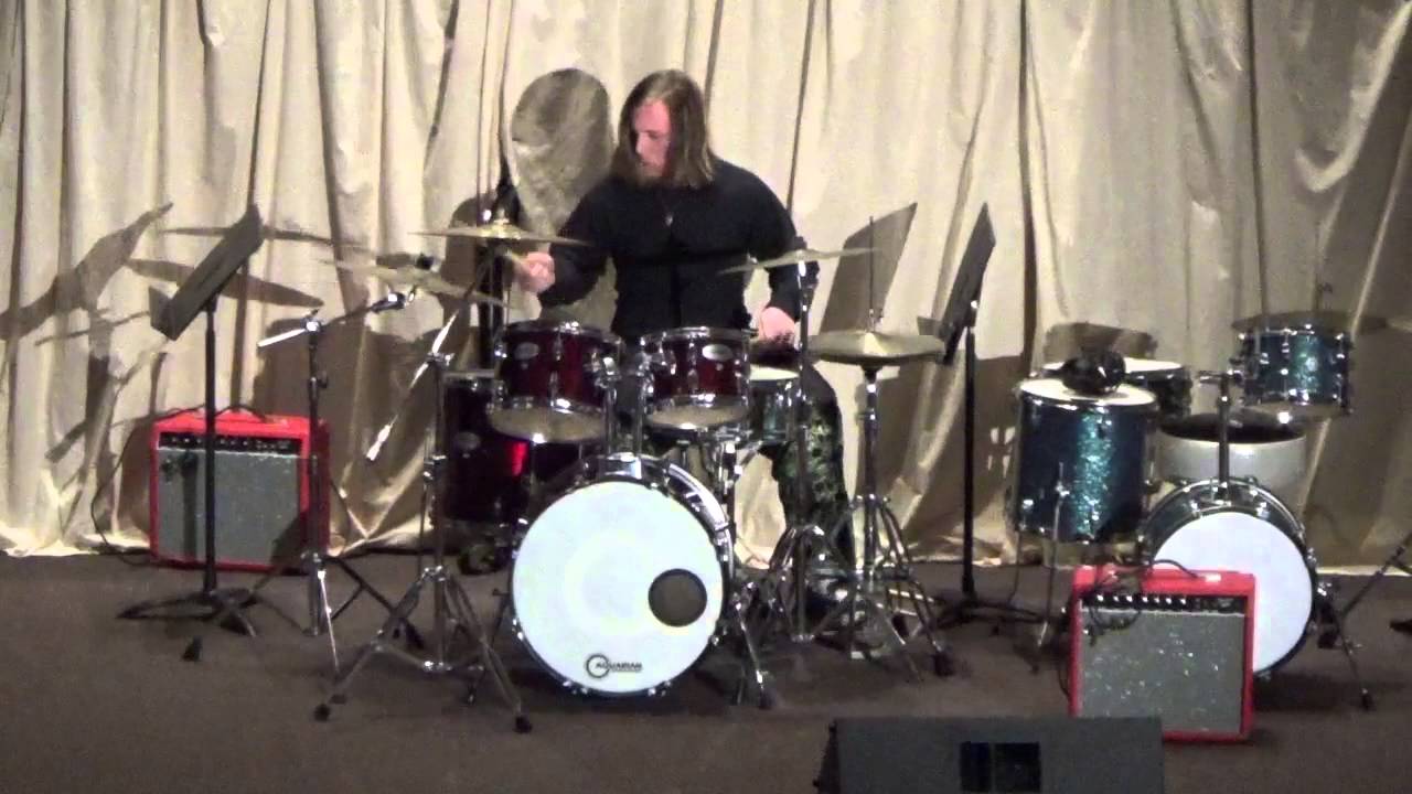 Thristen plays drums