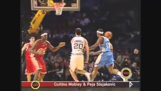 Carlos Boozer Facial on Chris Kaman in Rookie - Sophomore Game (2004)