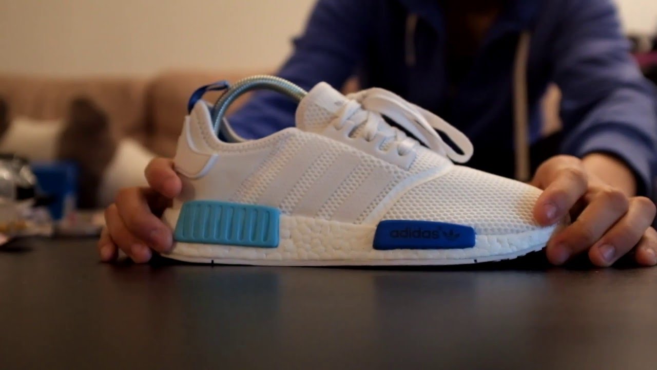 nmd r1 white blue glow