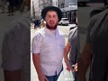 Just after being attacked yossi farro puts on tefillin on people that tried stopping the attacker