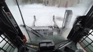 Operating a Halverson 140 wood processor on  Bobcat T550 standard joystick controls