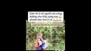 Cô gái người Lào cúng dường cho các thầy