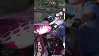 Chick riding a big wheel bagger!