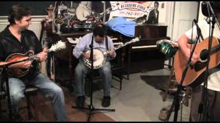 The Travelin' McCourys and Keller Williams in the studio recording "Broken Convertible" chords