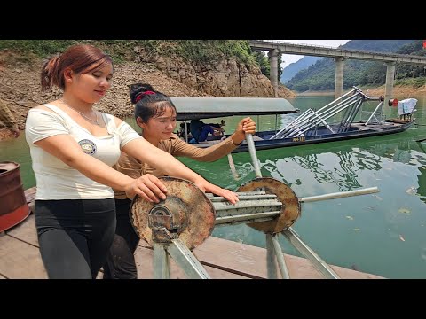 2 girls on the lake as mechanics to serve fishing fishing.