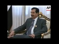 الرئيس العراقي صدام حسين يجتمع مع جورج كالوي عضو حزب العمل الحاكم في بريطانيا 