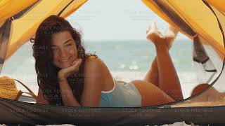 Woman in Bikini on the Beach in a Tent