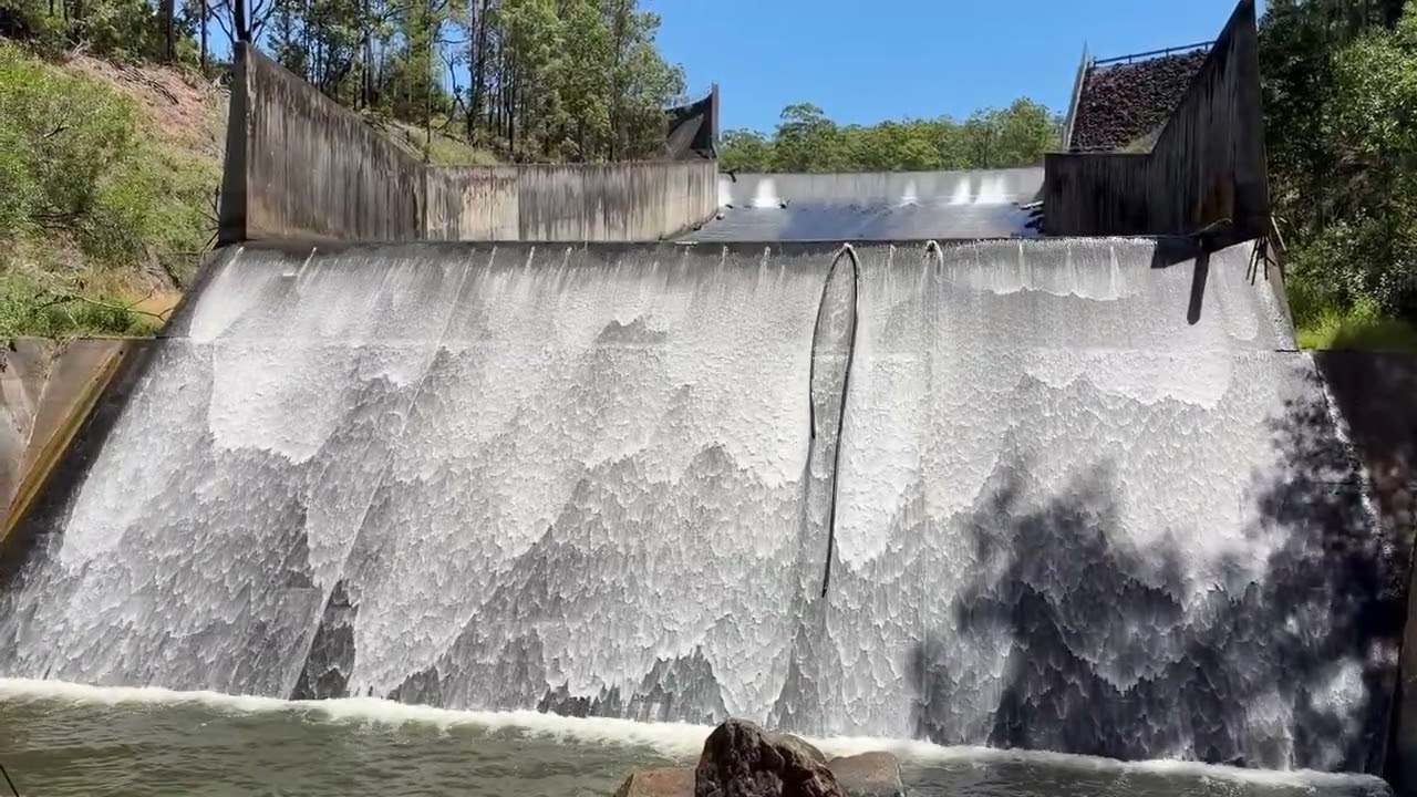 Roll waves in slow motion