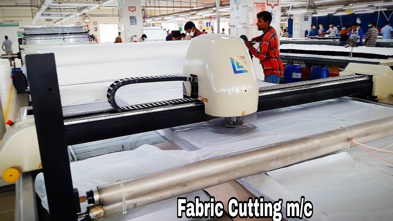 Automatic Fabric Spreading and Fabric Cutting machine //Gerber