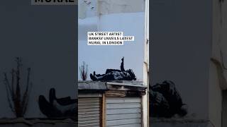 UK street artist Banksy unveils latest mural in London | AFP