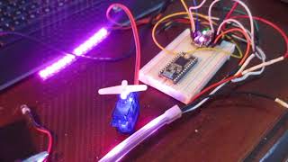 XRAD'S Neopixel fade with slow servo control Trinket M0