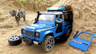 Rescue the police car stuck in the cave with excavator and crane truck  Toy car story