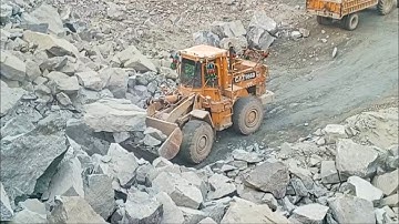 Caterpillar loader 966D big rocks loading trolleys#video#viralvideo#viralshorts#youtubevideo#rock