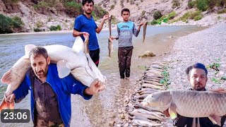 Fish hunting in a dangerous river: with Mahdi and Nima in search of countless fish catches