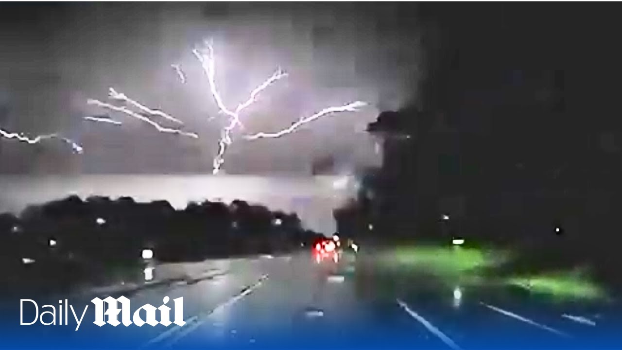 Lightning strike sparkles across Virginia skyline in breathtaking dashcam footage