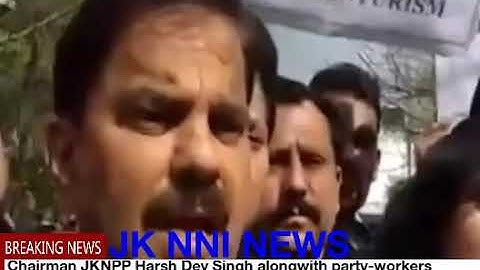 Chairman JKNPP Harsh Dev Singh alongwith party-workers stages protest demonstration in Jammu.