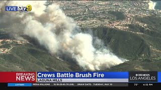 Fire crews battling brush fire in Laguna Hills