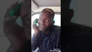 Mr Chimpwena talking on phone. (Zed Commedy)