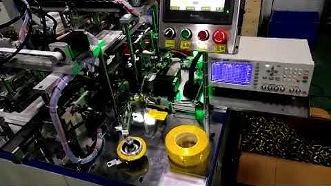 Automatic EE core assembly, taping & testing machine. For transformers.