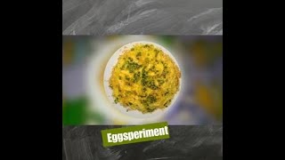 Scrambled egg topped with sesame seeds (Eggsperiment)