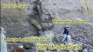 Ran to Save Themselves From a Large Landslide on a Cliff of Solid Sand