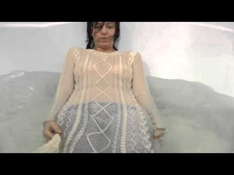 Tanya bath in white dress and pantyhose.