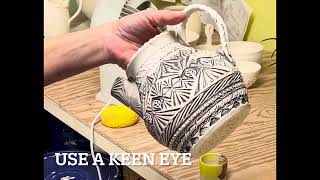 Rubbing underglaze into deep texture to make it POP