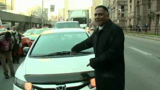 Caught  on camera: Taxi driver confronts Uber driver