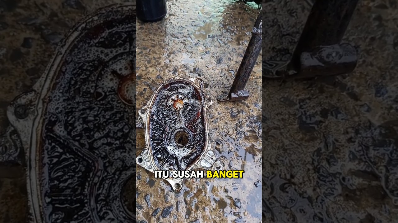 Membersihkan kerak oli palsu