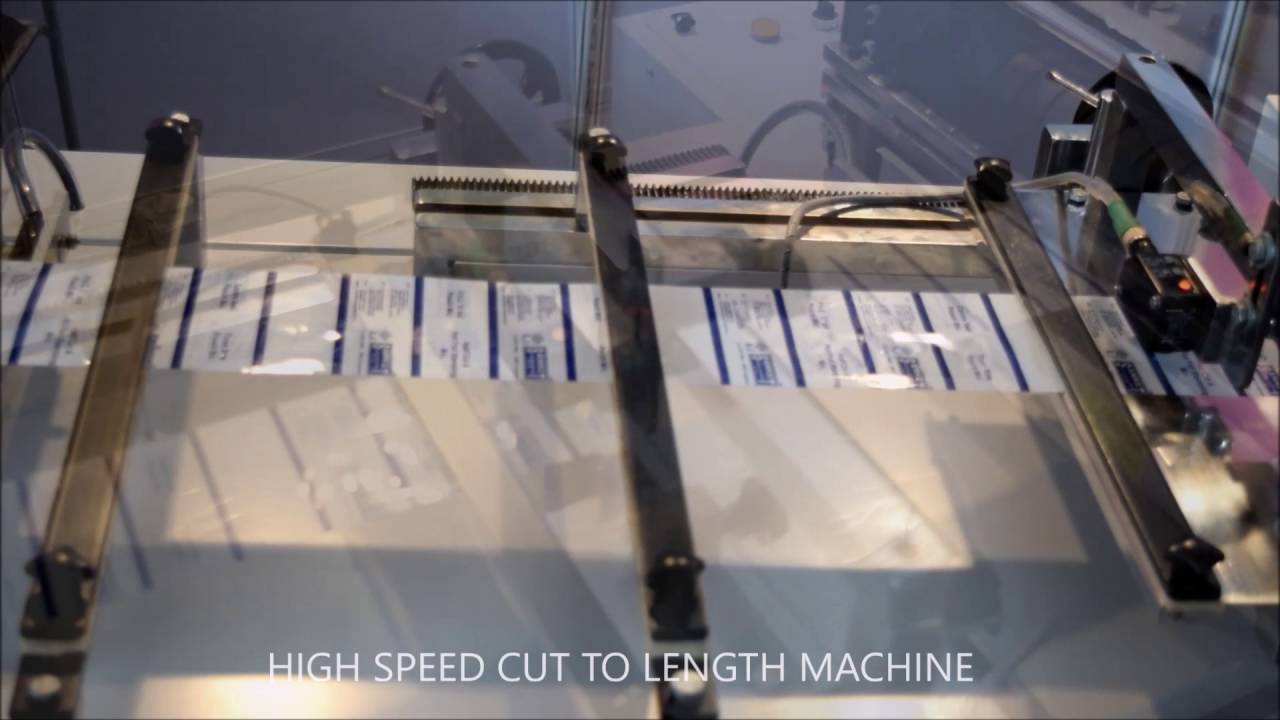 LABEL CUTTING MACHINE