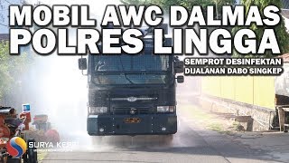 Polres Lingga Kerahkan Mobil AWC Semprot Disinfektan Jalanan Dabo Singkep