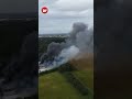 Aerial footage captures HUGE SMOKE plume as fire crews battle blaze