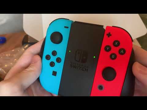 Видео: Обзор и распаковка на Nintendo Switch  (новая ревизия Нинтендо Свитч) | Никита Прохоров