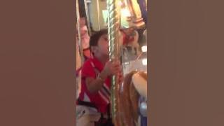 Gurtej playing carousel at IOI Mall