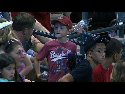 Kid misses ball,
