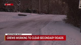 Crews work to clear secondary roads