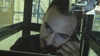 Murder suspect speaks from behind bars