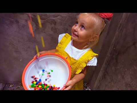 Alice and Eva try to catch candies and colored balloons Kids videos compilation