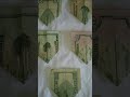 Twin Towers Destruction Illustrated On Folded US Currency Twin Towers Destruction Illustrated On Folded US Currency