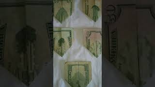 Twin Towers Destruction Illustrated On Folded Us Currency