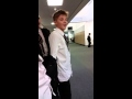 Kid does backflip in school hallway