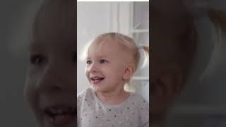 A Cute Girl Jumping On Bed With Happy Mood