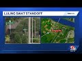 SWAT team executing arrest warrant in Luling