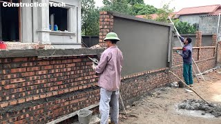 Traditional Techniques of Building Garden Fence Walls from Solid Terracotta Bricks in Modern Style