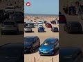 Police block road as people descend on Merseyside beaches