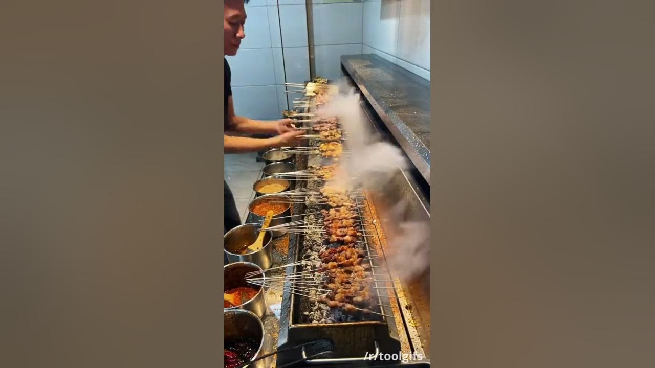 Commercial Downdraft Extractor Next to an Indoor Charcoal Grill shorts