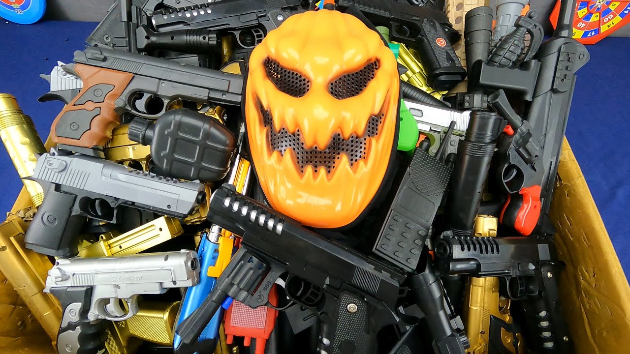 Halloween Special Pumpkin Mask, Box of Toy Guns, Realistic Rifles And Revolver Guns