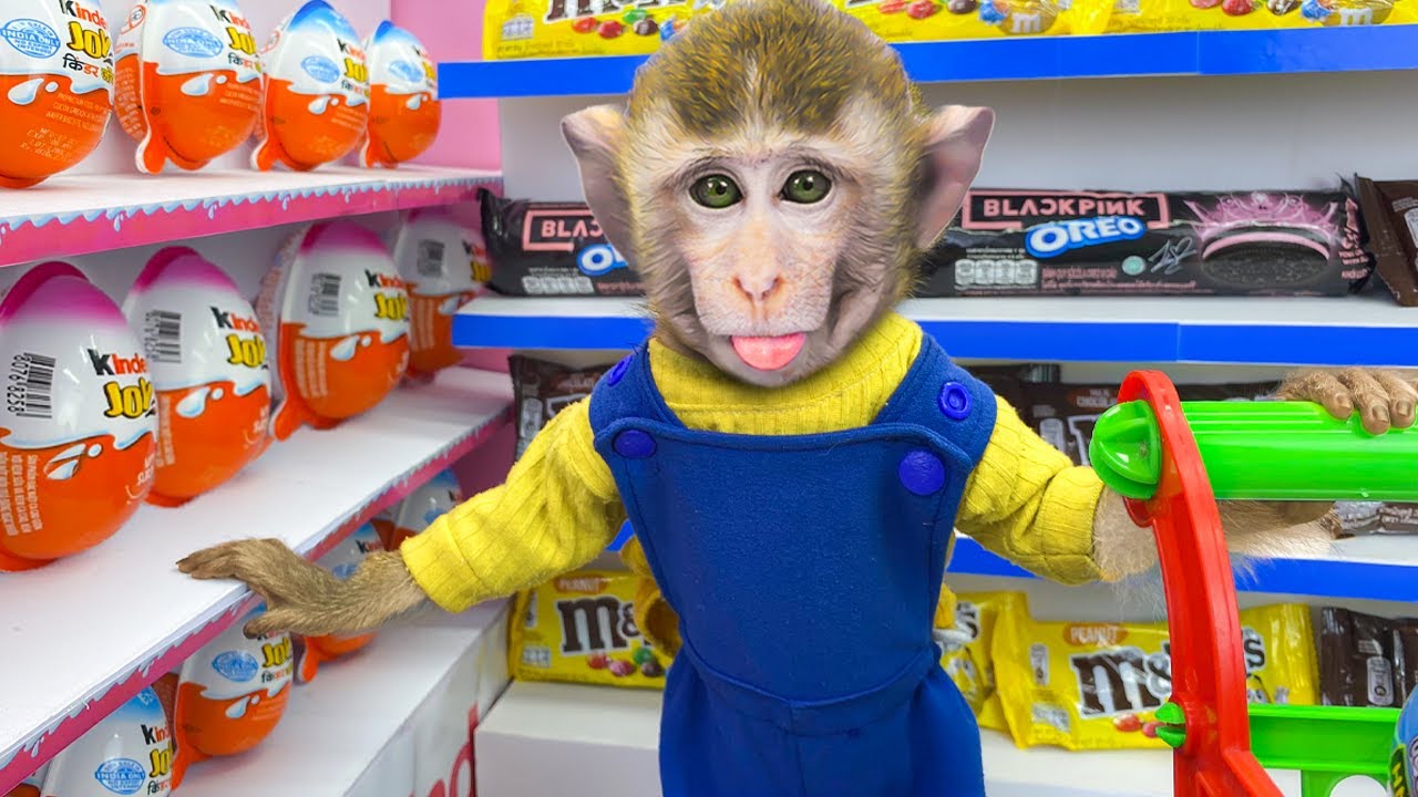 Baby Monkey Bim Bim buy surprise eggs candy Kinder Joy at supermarket