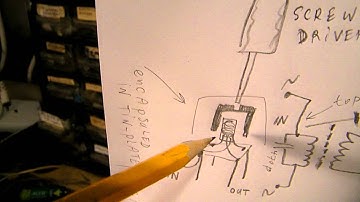 IF filter taken apart & how to "homebrew" a 455 KHz IF filter for a superhet.